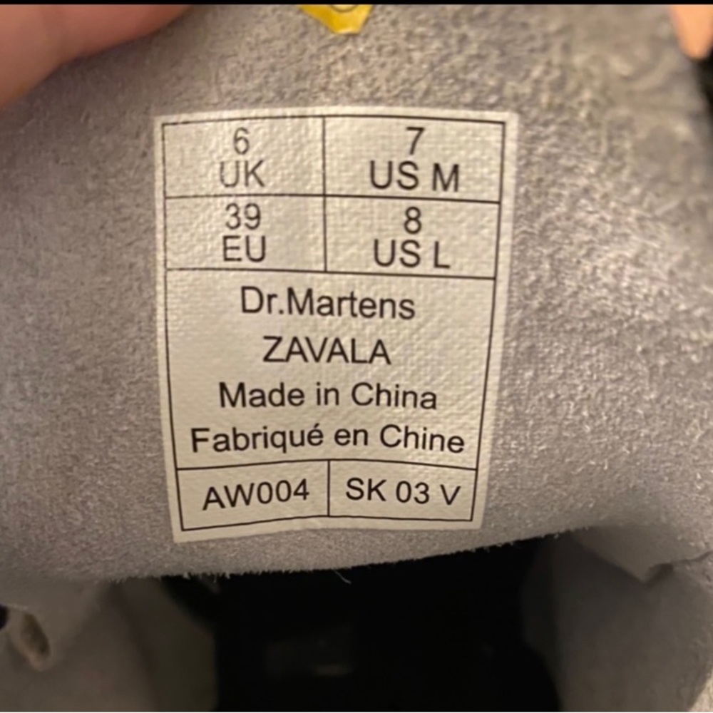 Woman’s white Doc Martins